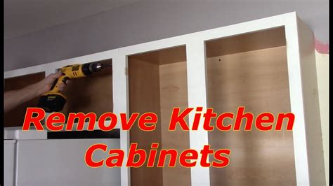 how to remove steel kitchen cabinets|how to take out metal cabinets.